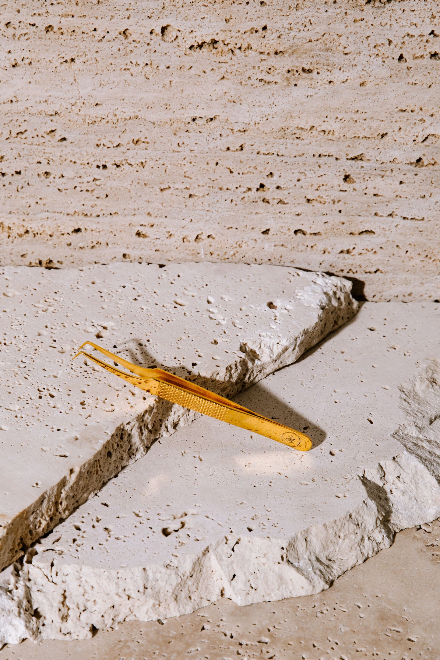 Gold L shaped volume tweezer