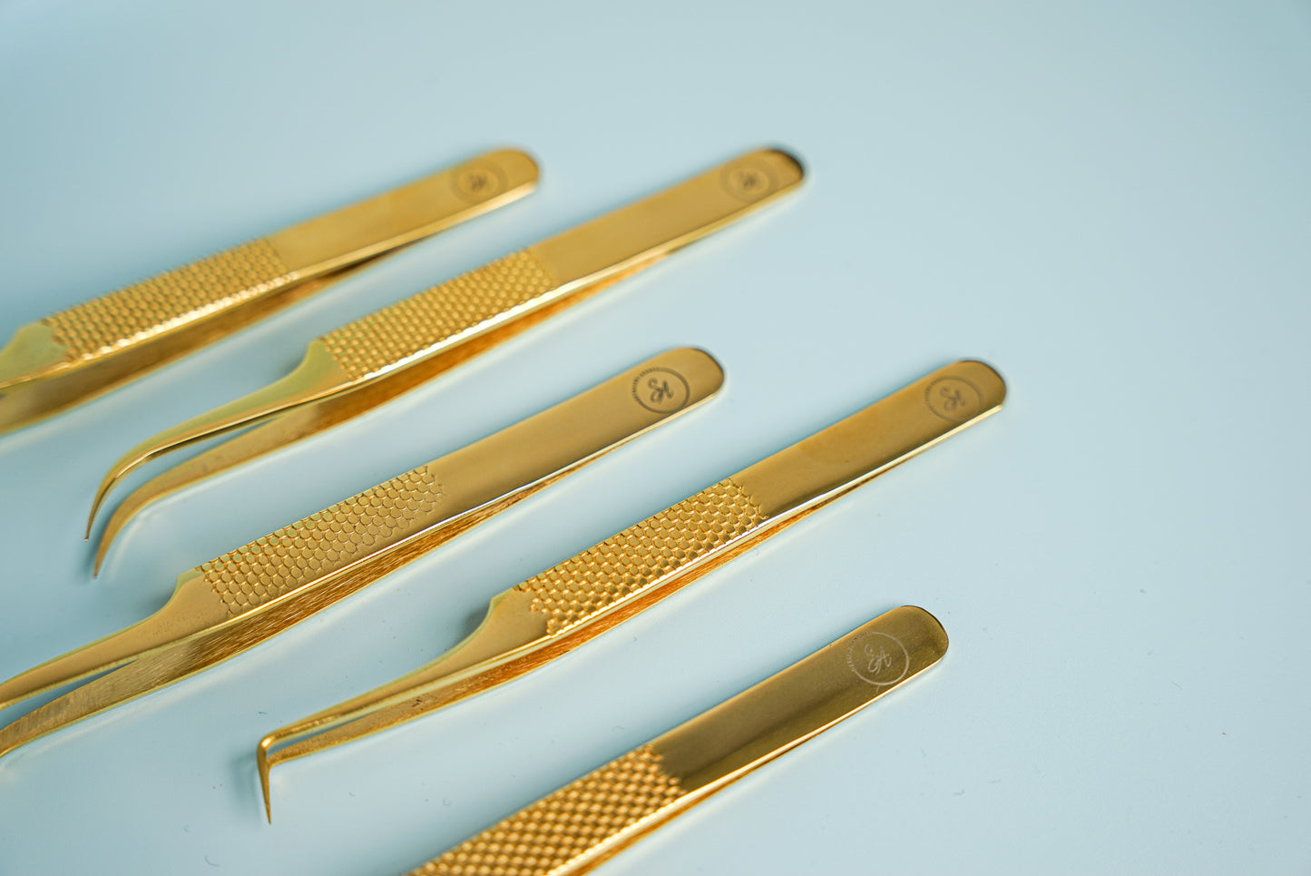 Gold Curved tweezer
