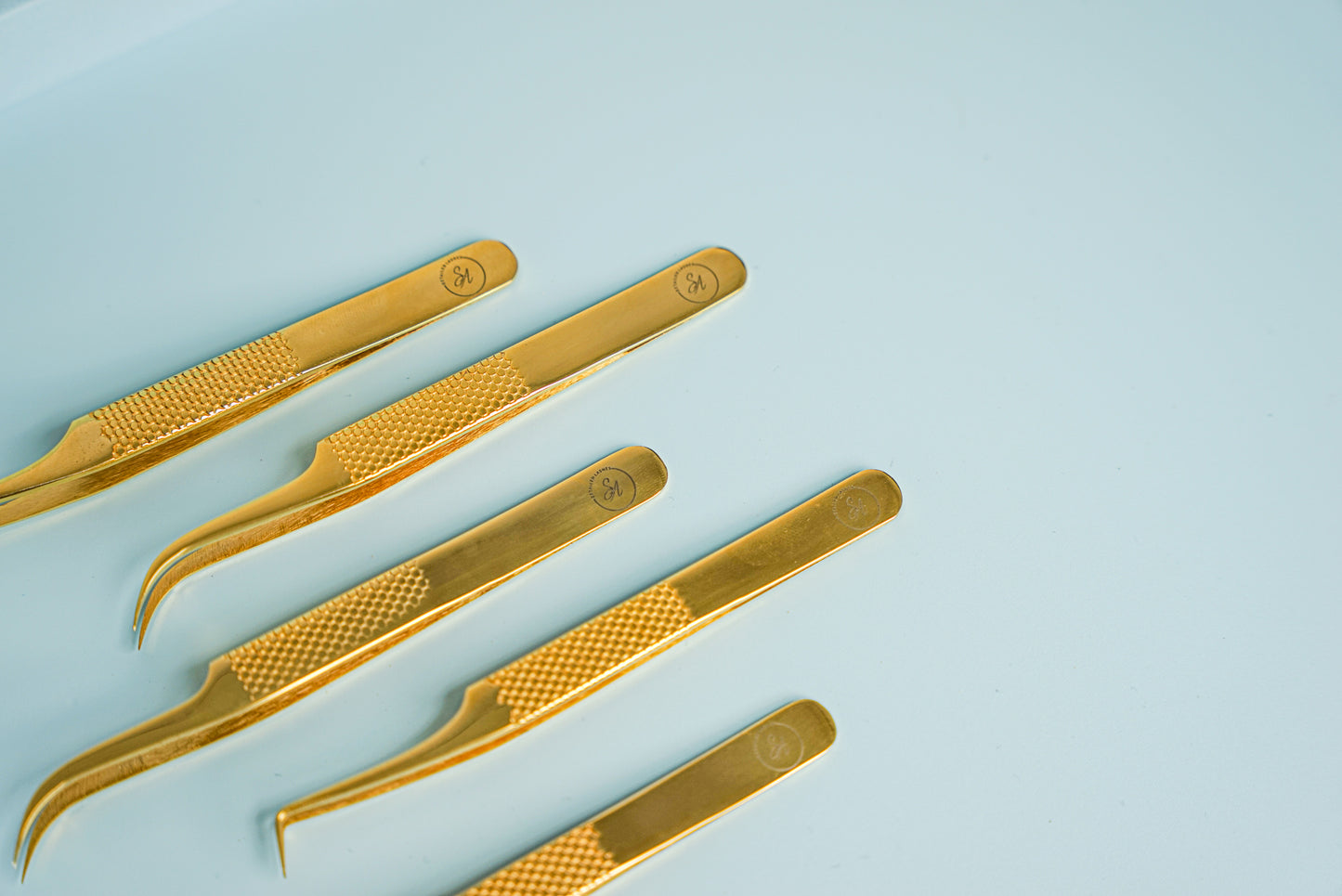 Gold Curved tweezer