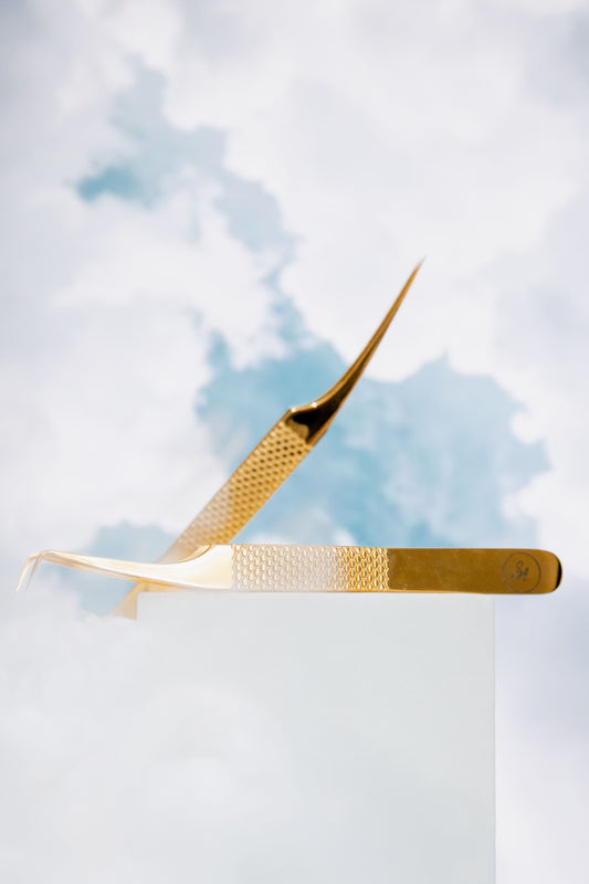 Gold L shaped volume tweezer